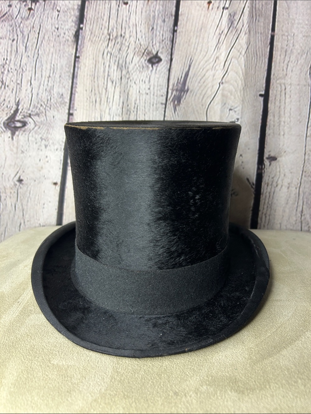 Antique black fur felt top hat by Henry Heath.